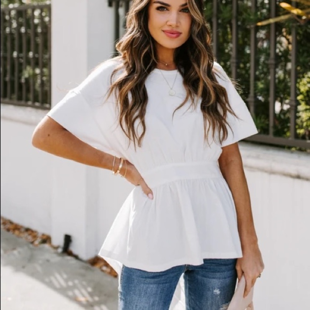 White peplum high low blouse